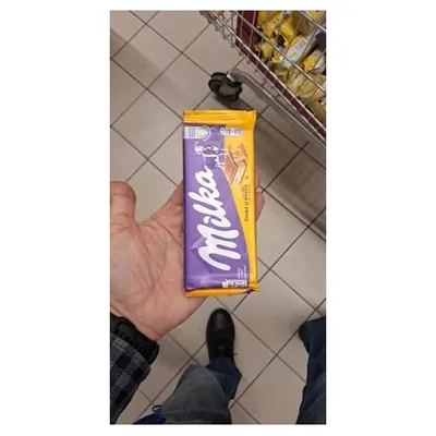 Milka cream biscuit chocolate, 100 g
