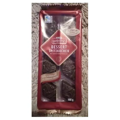 Lambertz gingerbread with candied fruits in dark chocolate "Spitz cake"