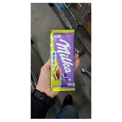 Milka шоколад с молочным кремом, 100 г