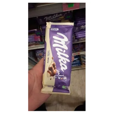 Milka пористый молочный и белый шоколад, 95 г