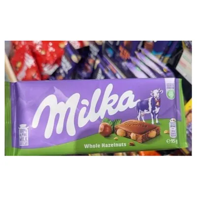 Milka шоколад с цельным фундуком, 95 г