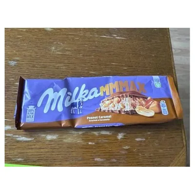 Milka chocolate with caramel and peanuts, 276 g